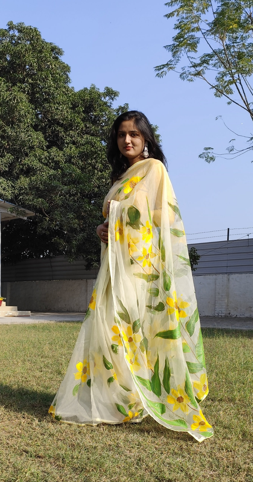 Hand painted white sunflower organza saree