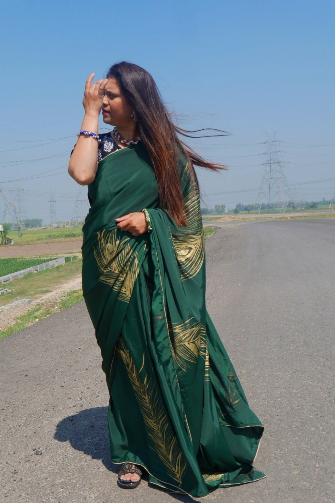 Sea green handpainted feather crepe silk saree