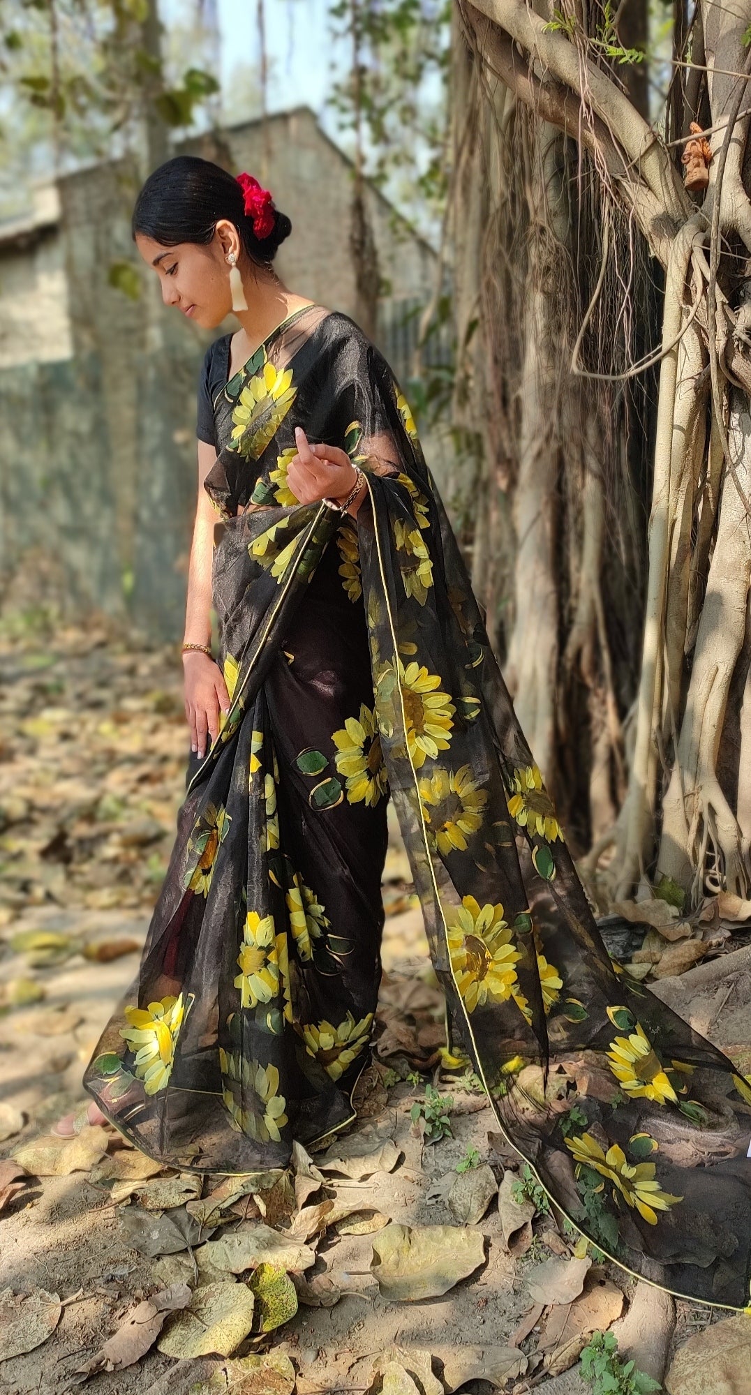 Black Hand-painted organza saree with tassels