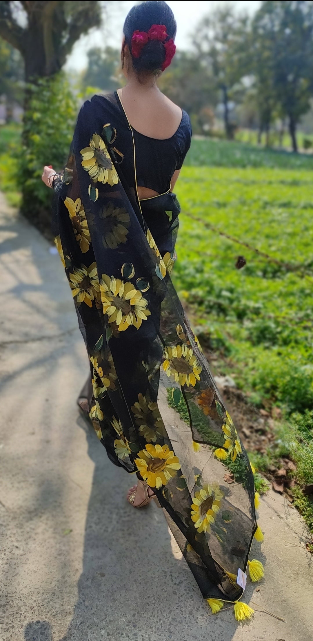 Black Hand-painted organza saree with tassels