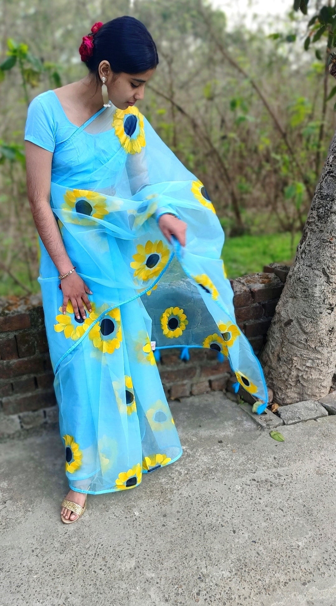 Sky blue Hand-painted organza saree with tassels