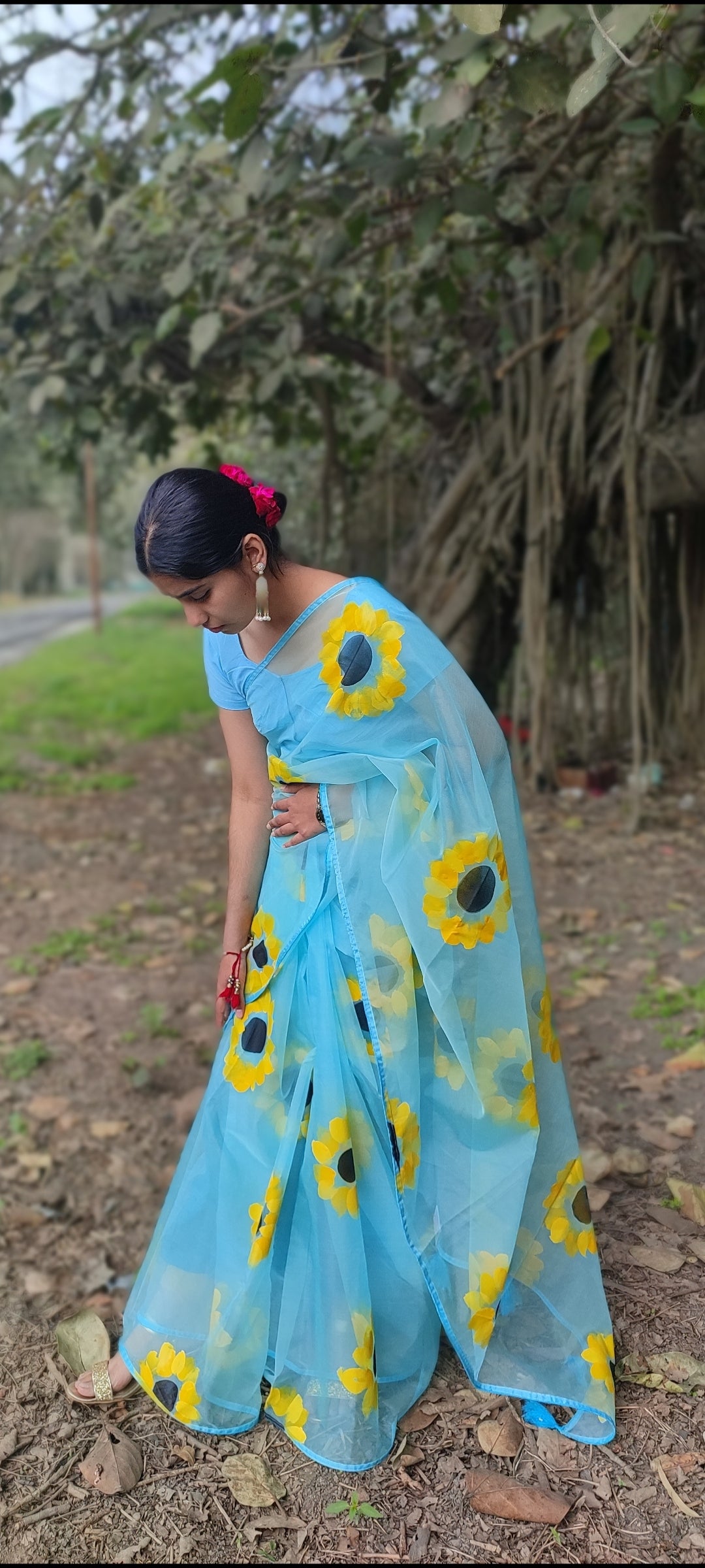 Sky blue Hand-painted organza saree with tassels