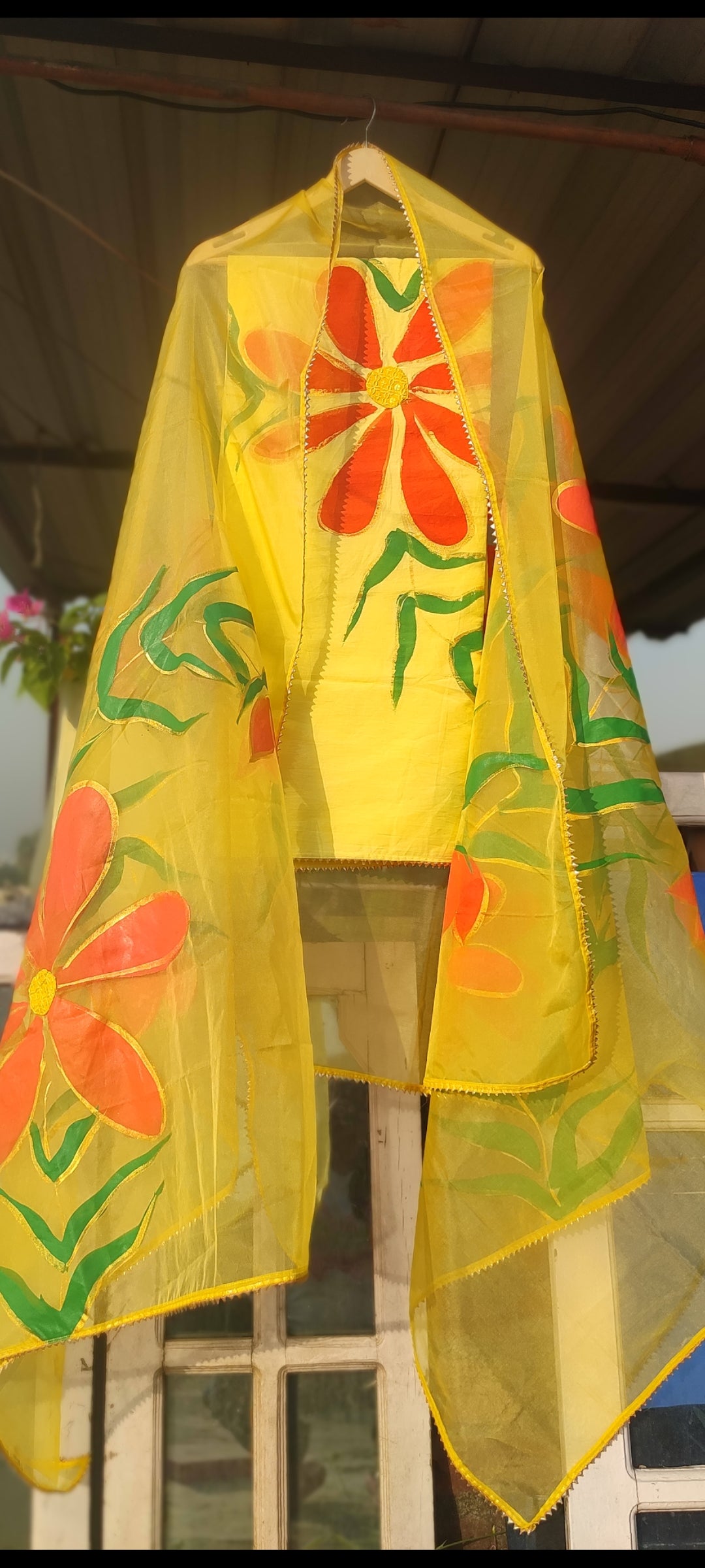 Hand-painted cotton suit with organza floral dupatta