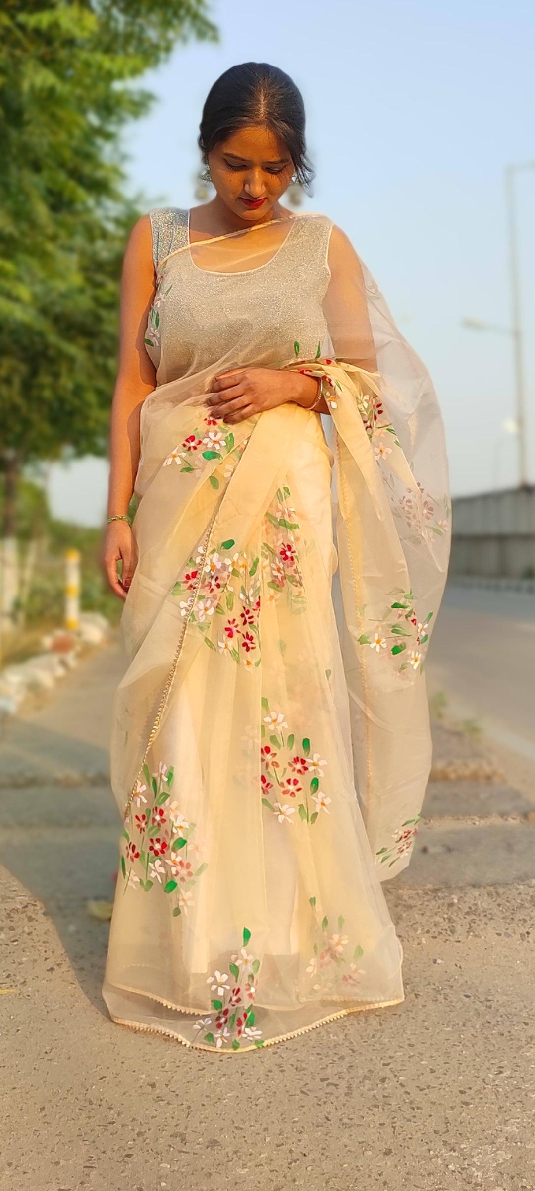 Beige Handpainted organza saree with tassels