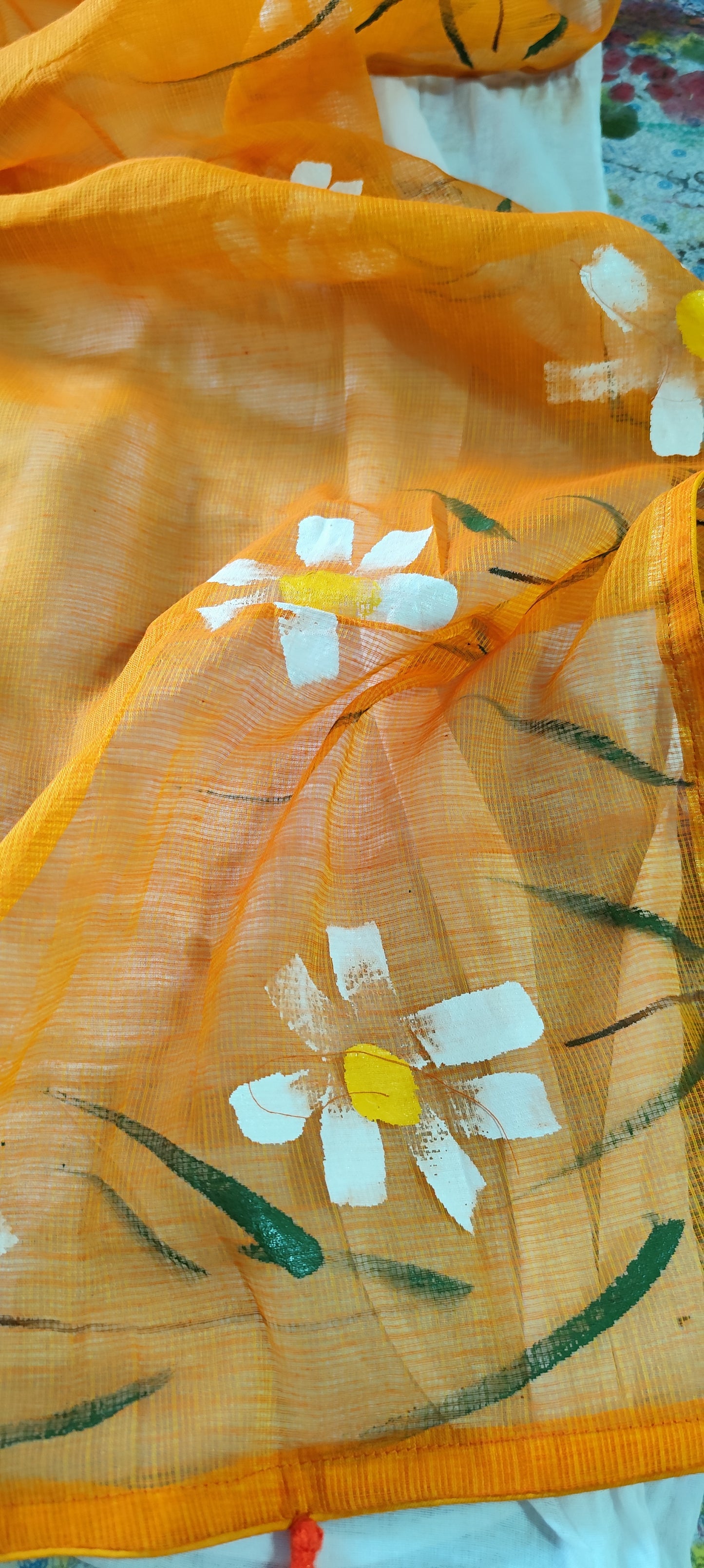 Handpainted orange pure cotton suit with white blossoms and kota doria dupatta