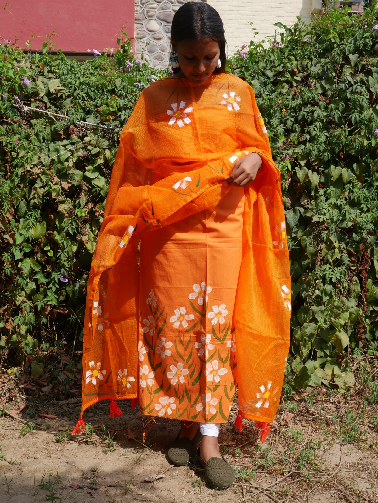 Handpainted orange pure cotton suit with white blossoms and kota doria dupatta