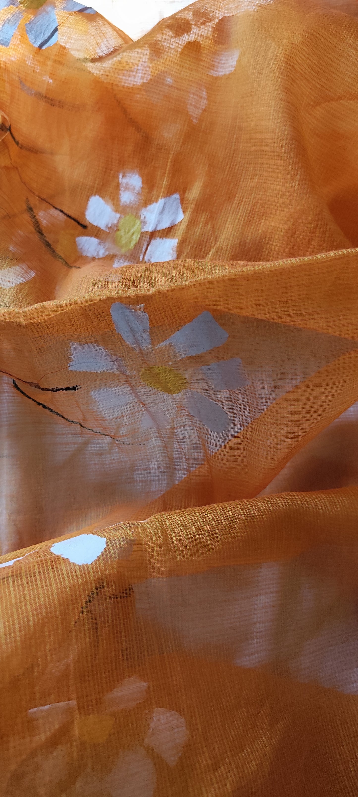 Handpainted orange pure cotton suit with white blossoms and kota doria dupatta