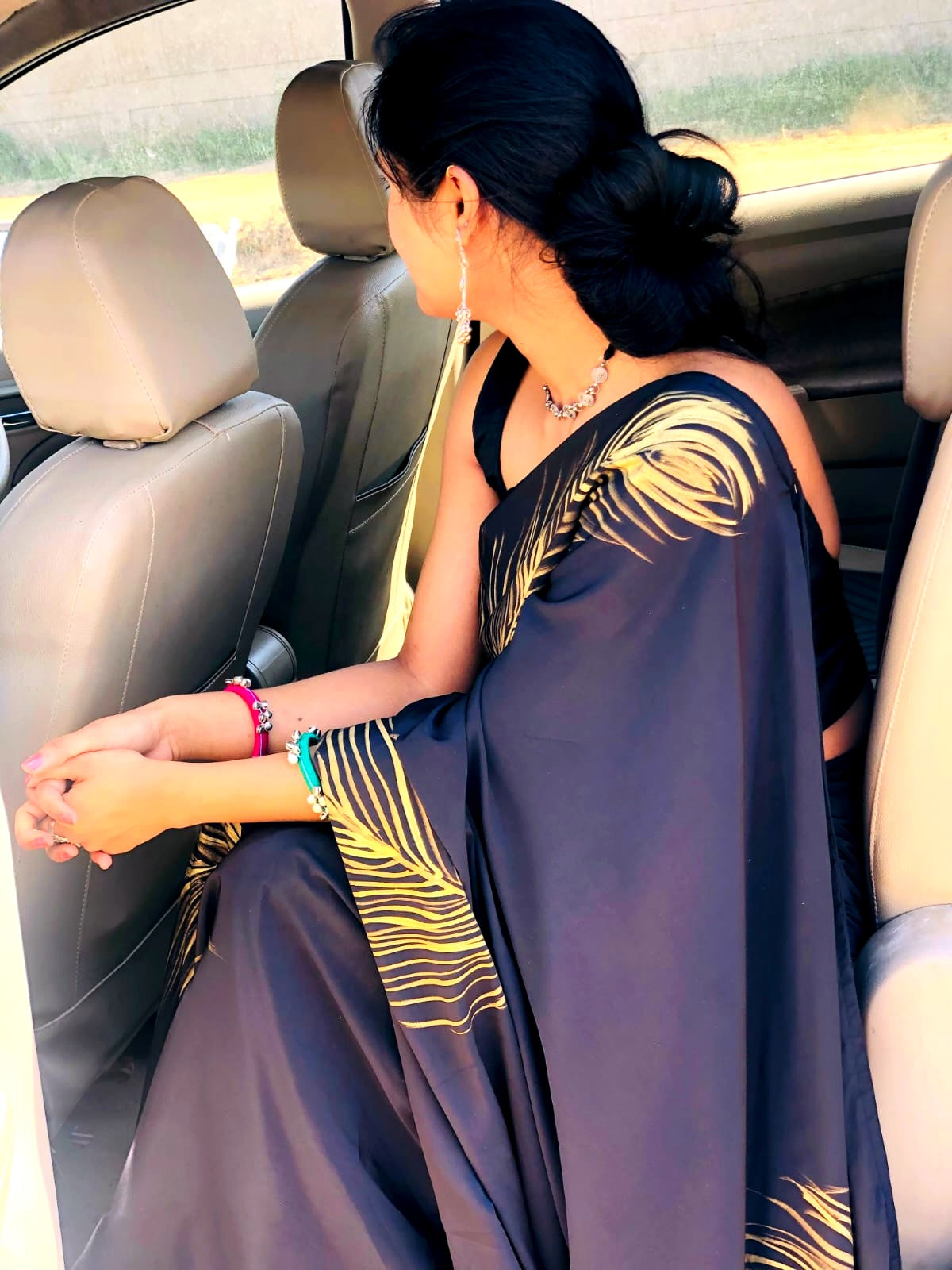 Black handpainted feather crepe silk saree