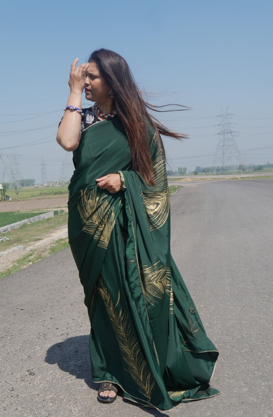 Sea green handpainted feather crepe silk saree