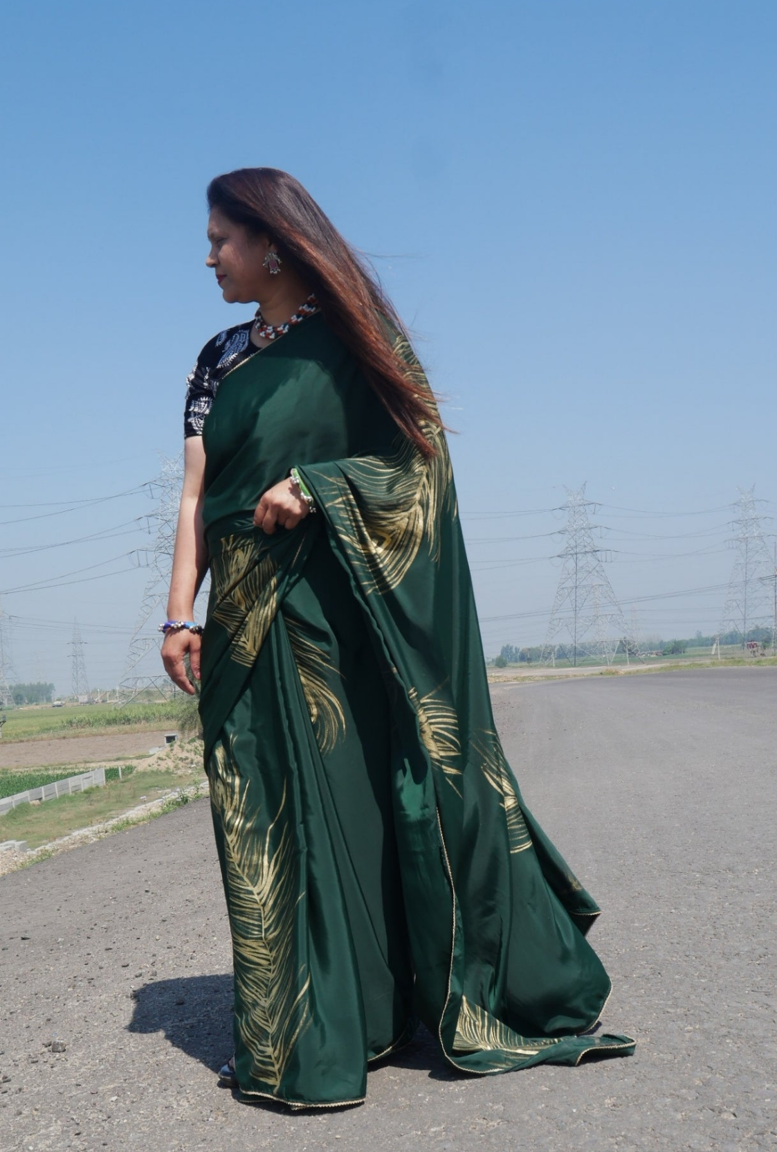 Sea green handpainted feather crepe silk saree