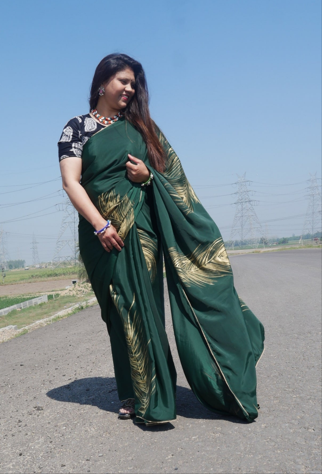 Sea green handpainted feather crepe silk saree