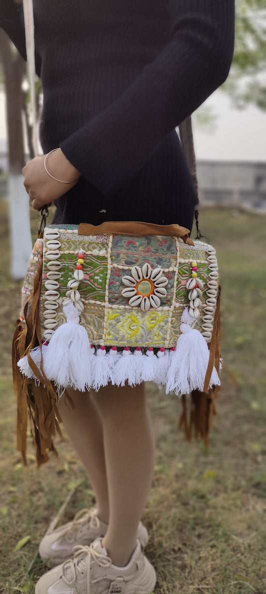 White boho banjara sling bag with tassels