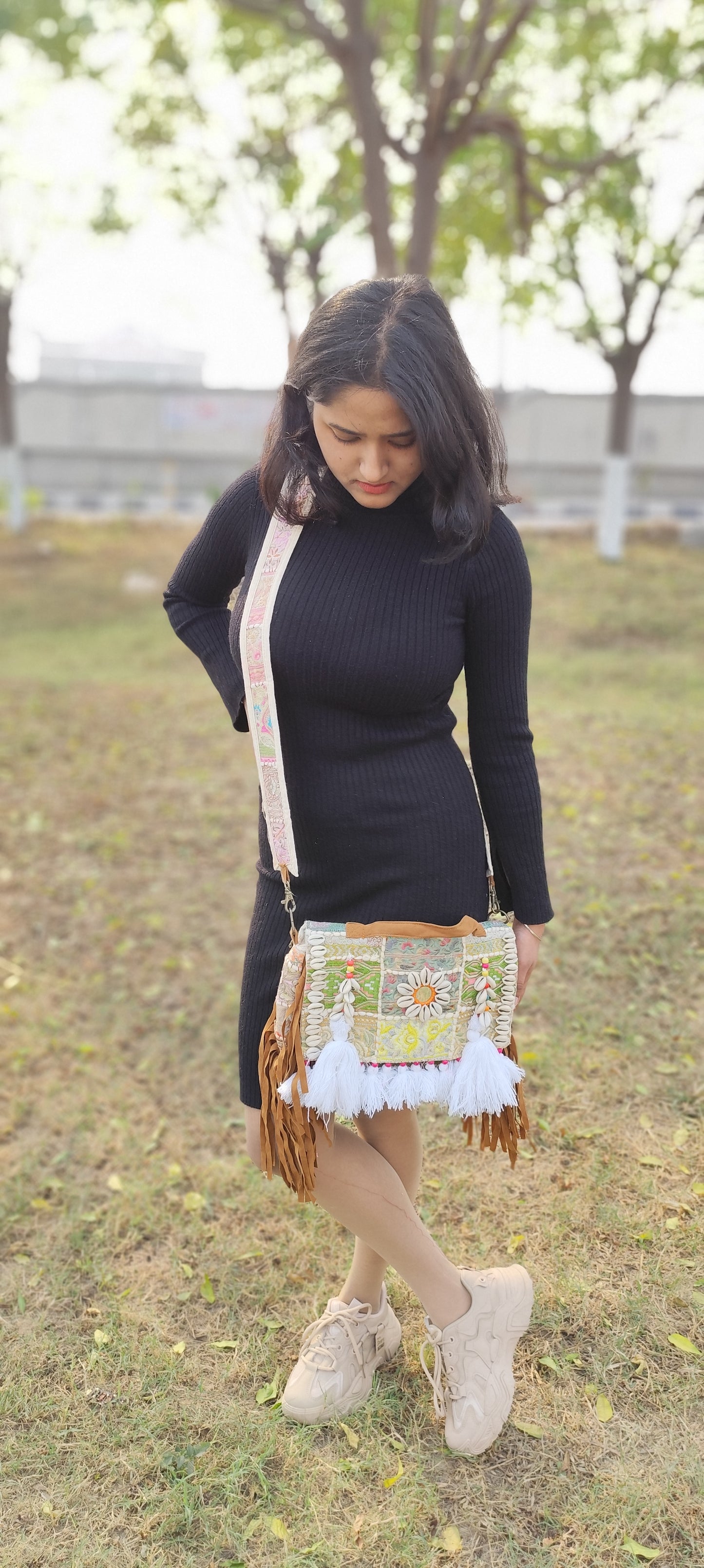 White boho banjara sling bag with tassels