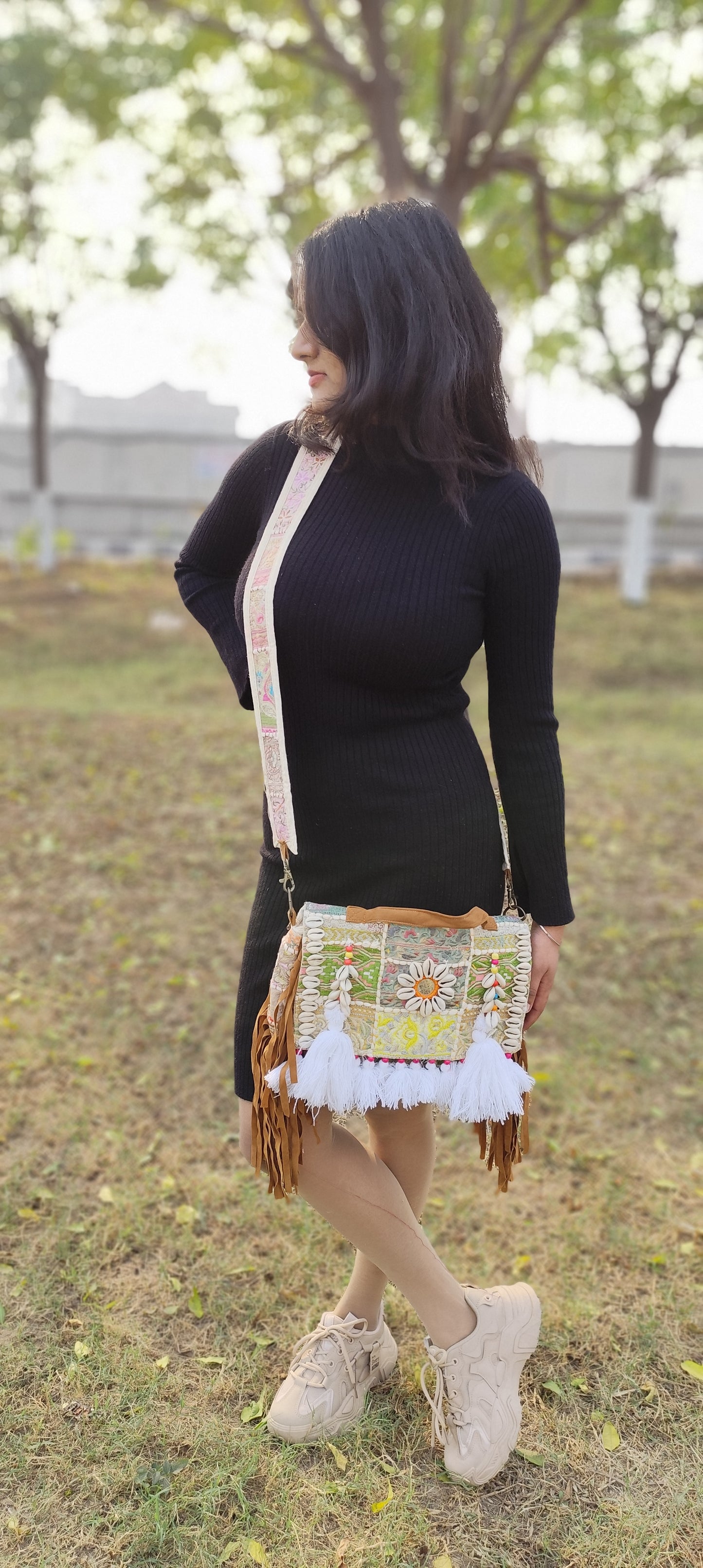 White boho banjara sling bag with tassels