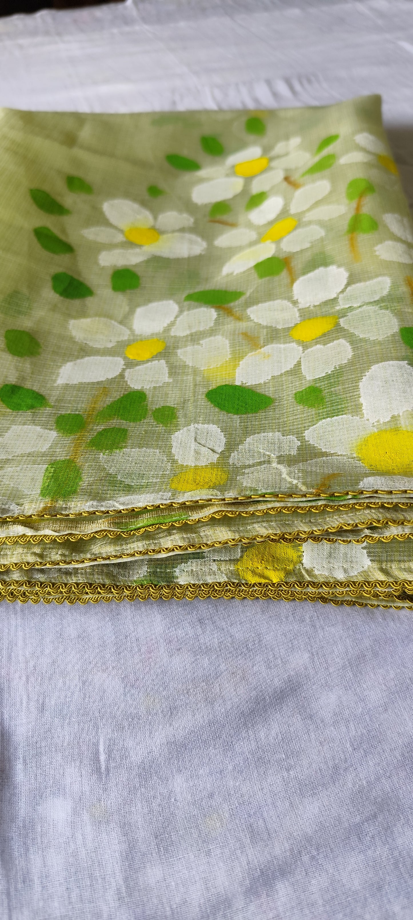 Pista green handpainted kota doria suit with white motifs