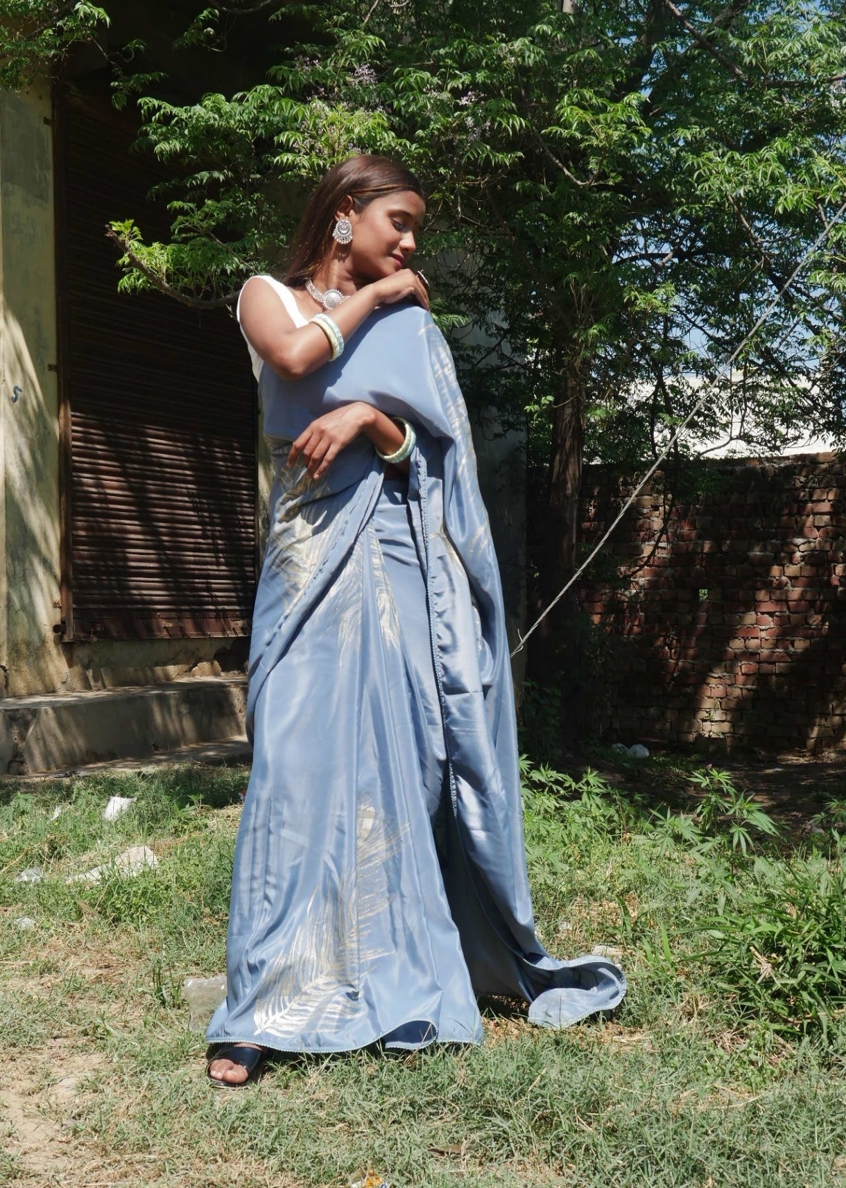 Grey crepe silk  handpainted feather saree