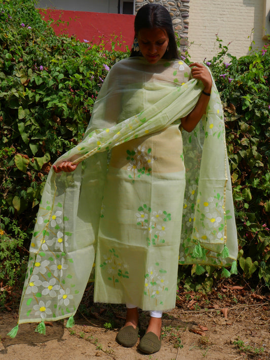 Pista green handpainted kota doria suit with white motifs