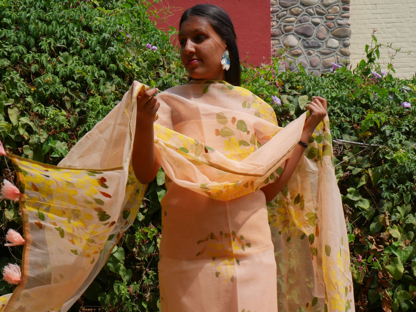 Handpainted amaltas on peach kota doria suit