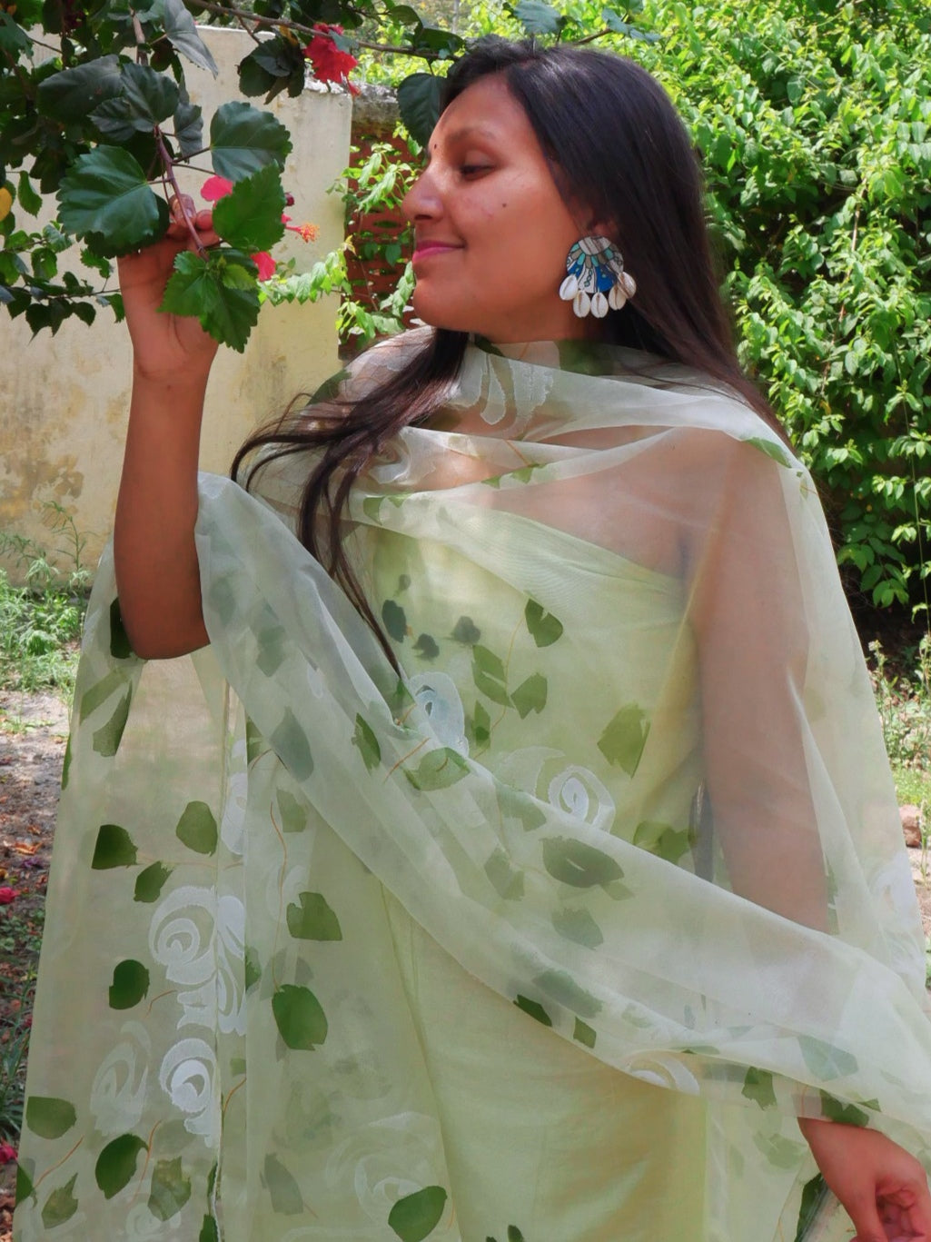 Hand painted roses on Pista green chanderi suit with organza dupatta