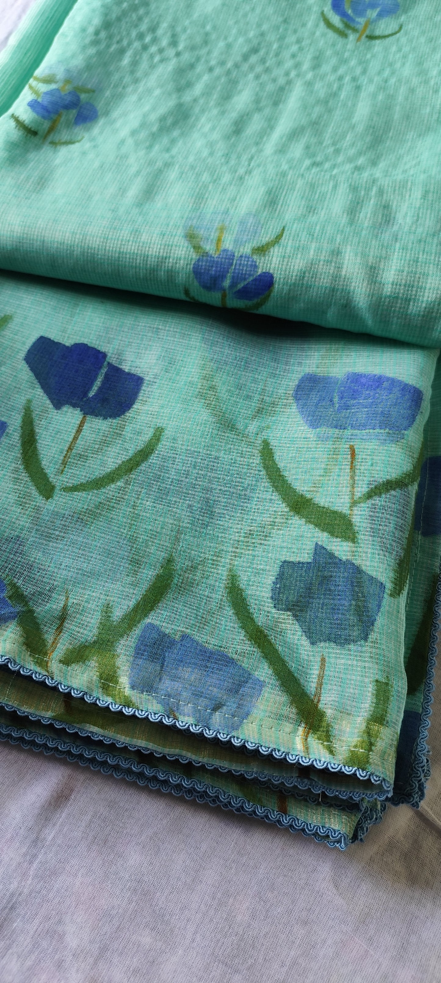 Turquoise blue hand painted blossoms on kota doria