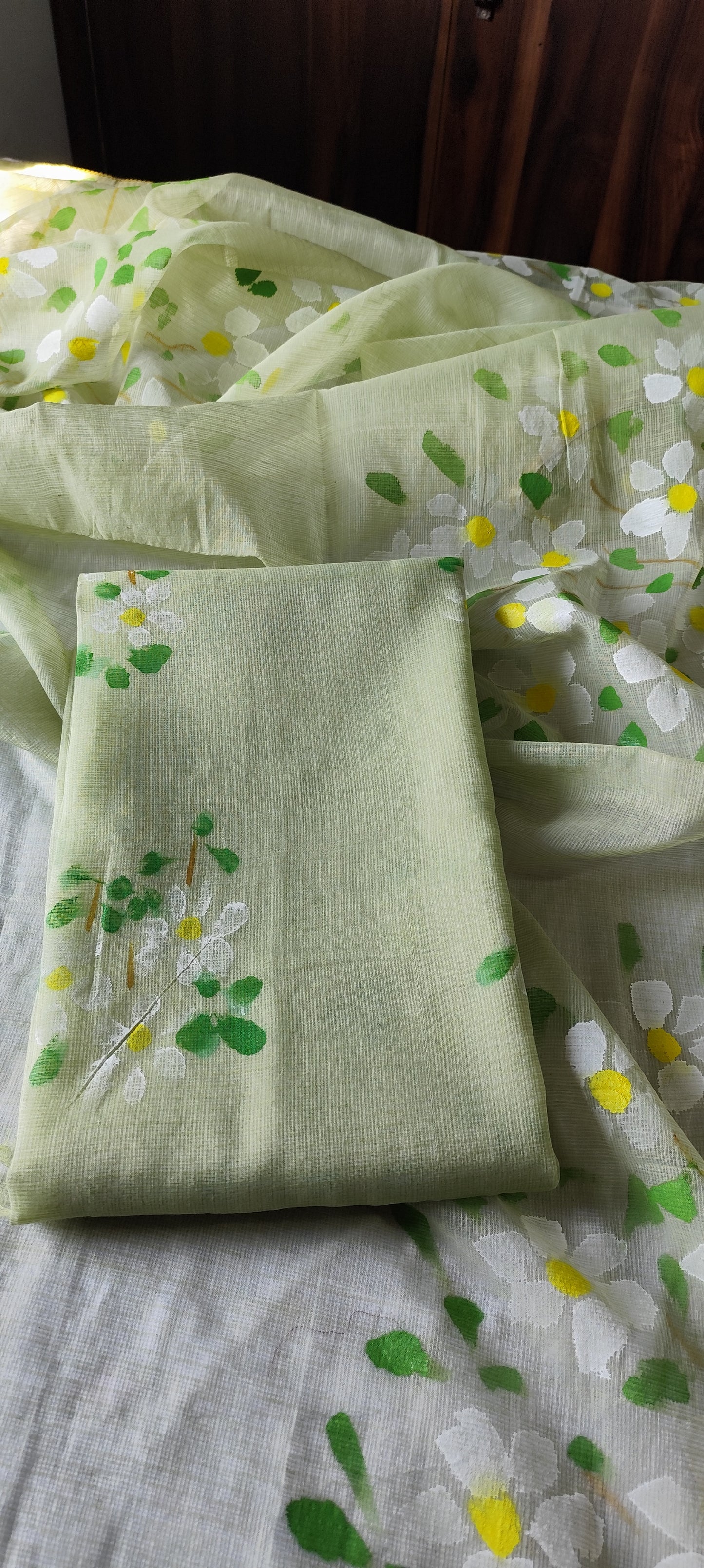 Pista green handpainted kota doria suit with white motifs