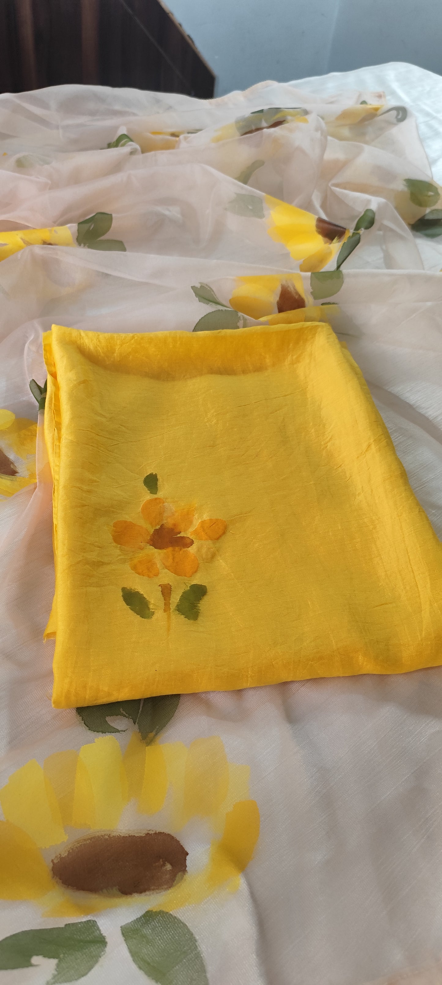 Handpainted sunflower on yellow chanderi suit and organza dupatta