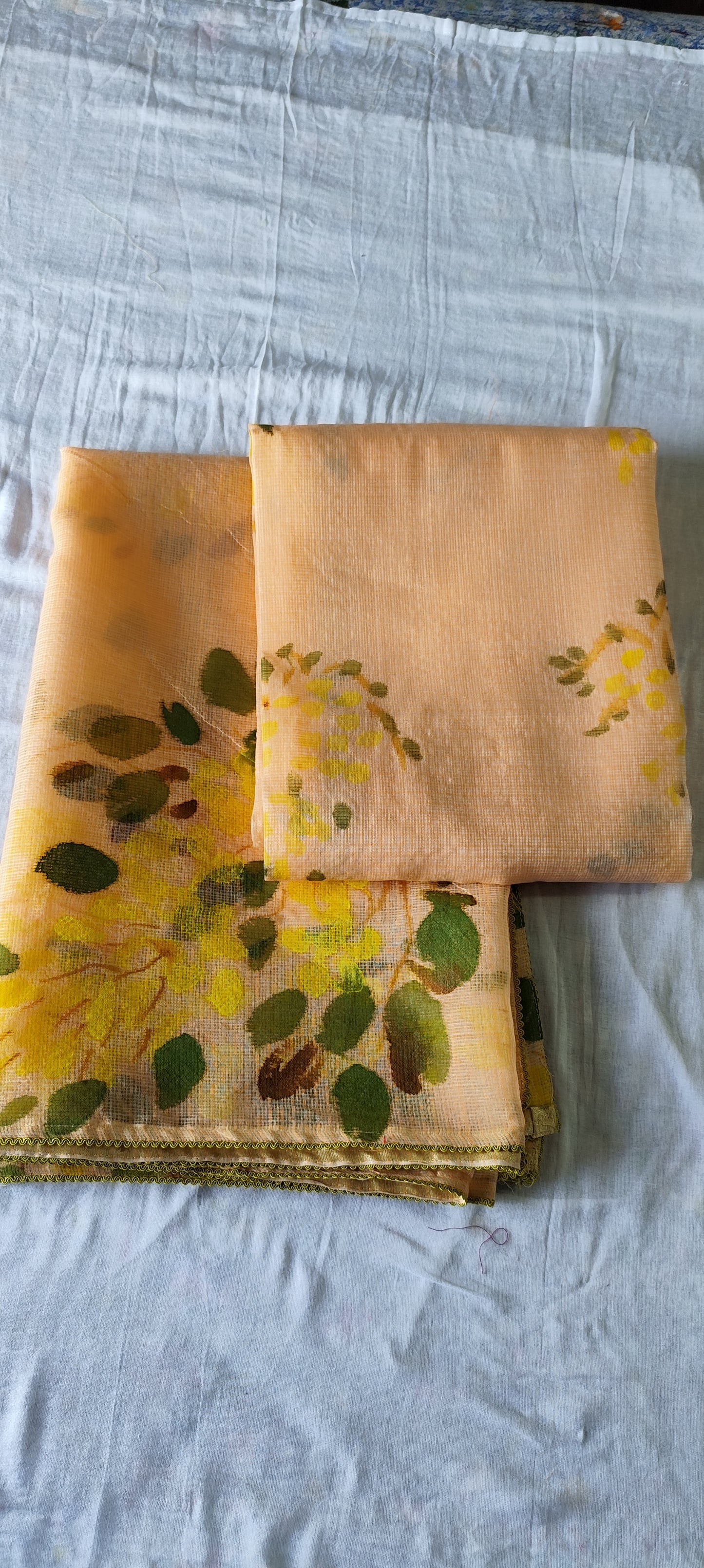 Handpainted amaltas on peach kota doria suit