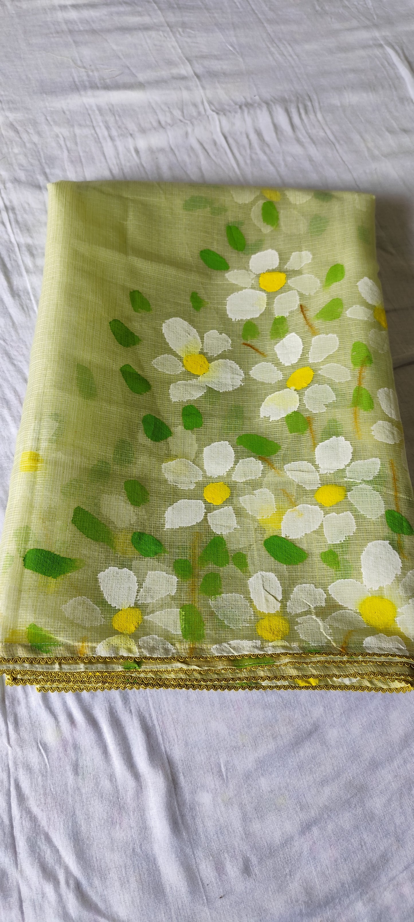 Pista green handpainted kota doria suit with white motifs
