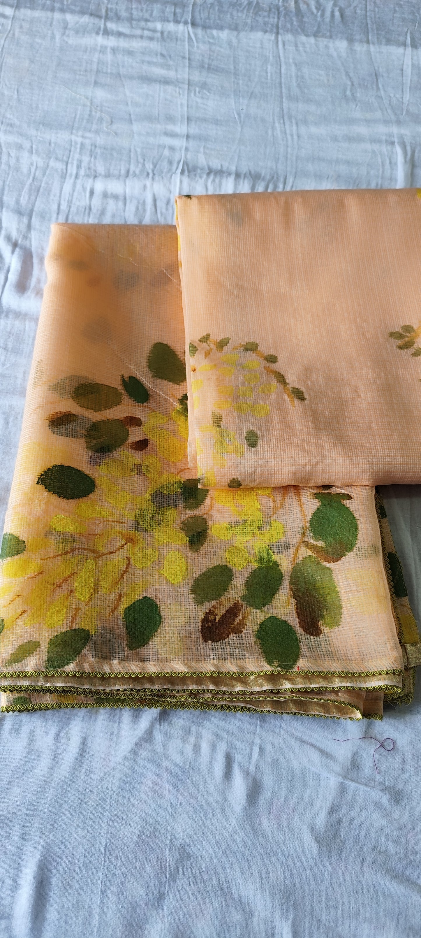 Handpainted amaltas on peach kota doria suit