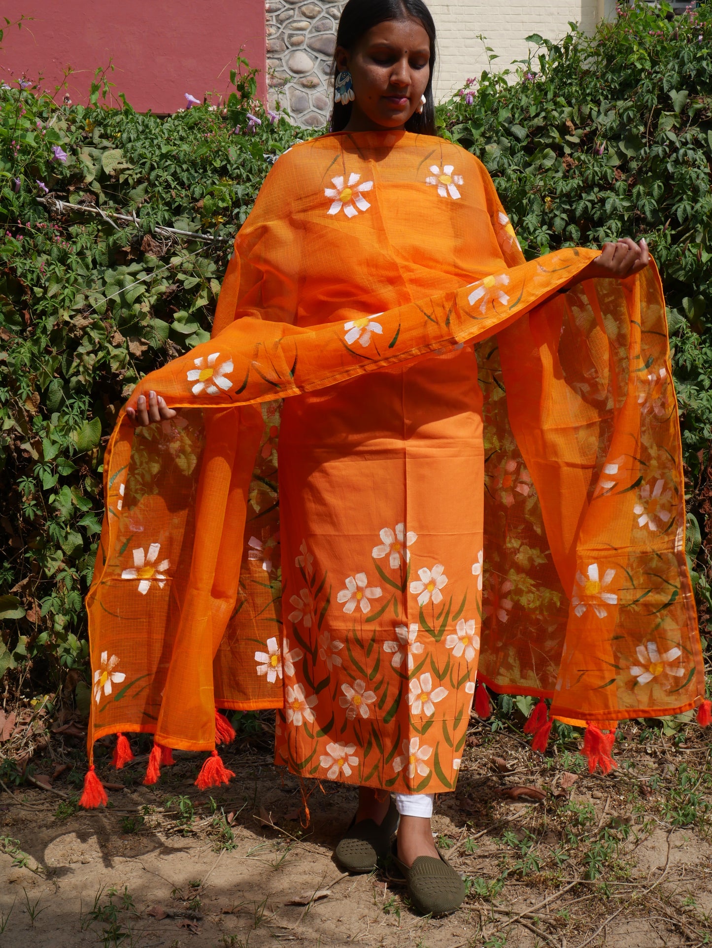 Handpainted orange pure cotton suit with white blossoms and kota doria dupatta