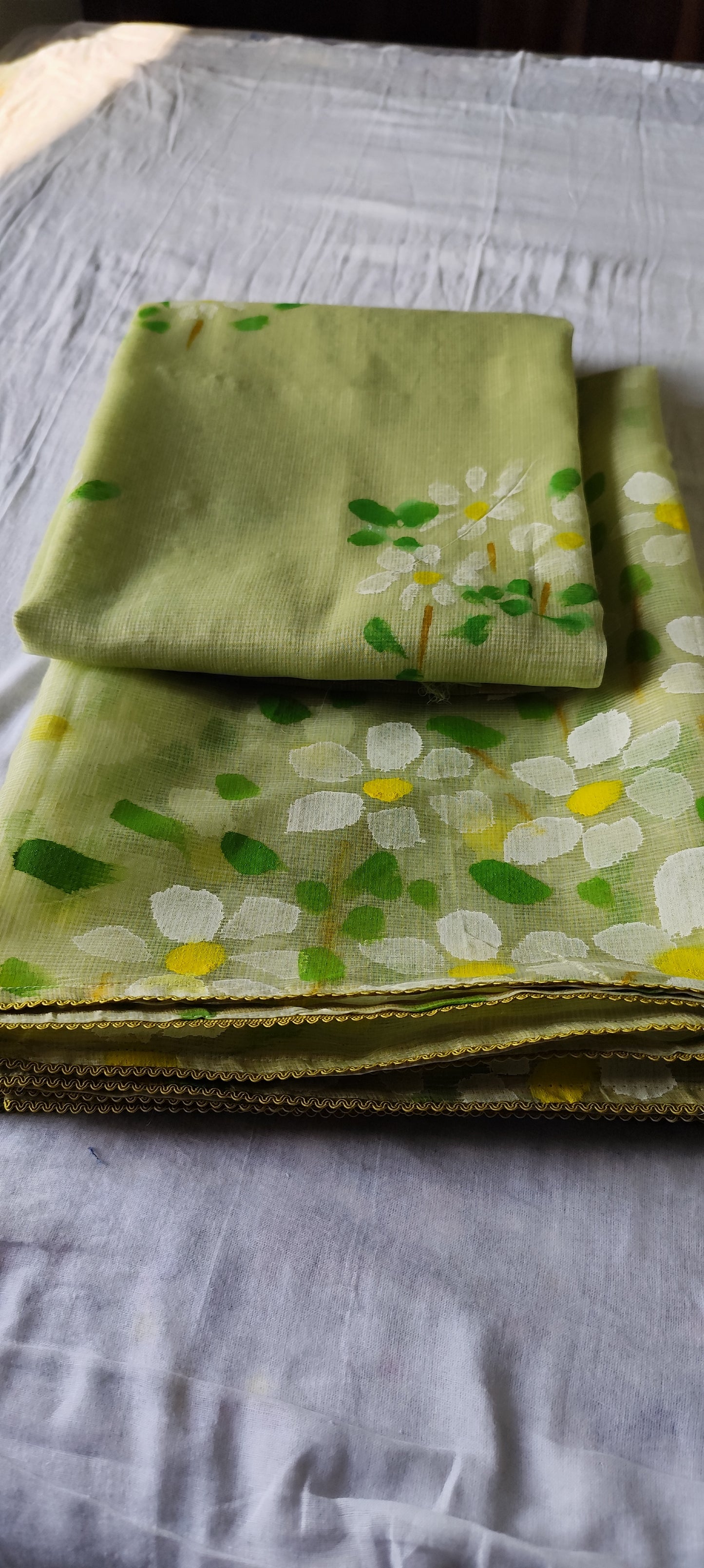 Pista green handpainted kota doria suit with white motifs