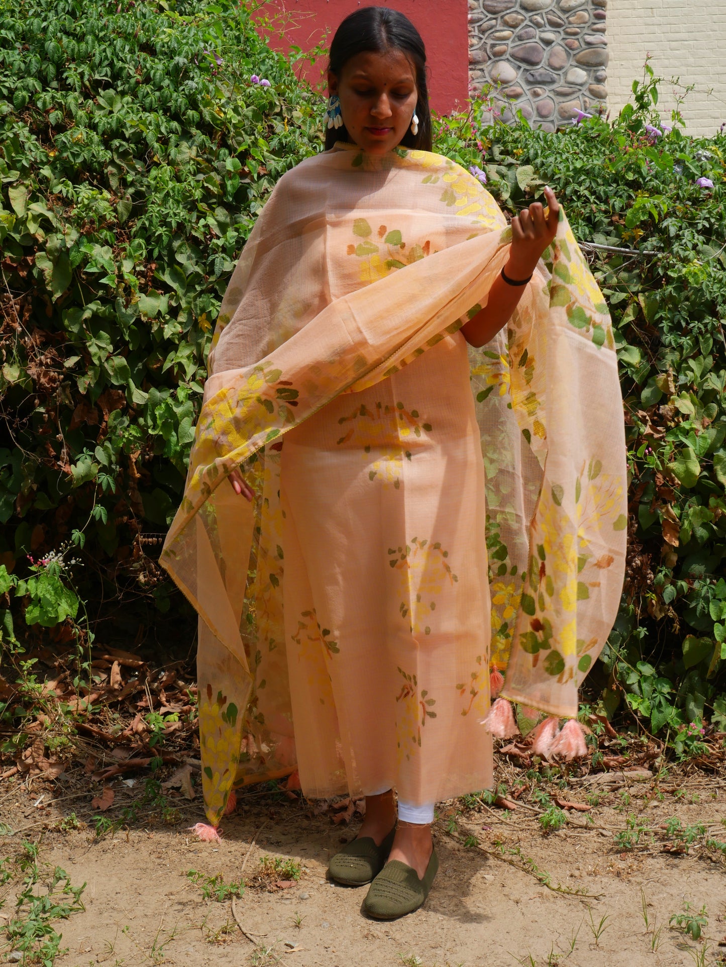 Handpainted amaltas on peach kota doria suit