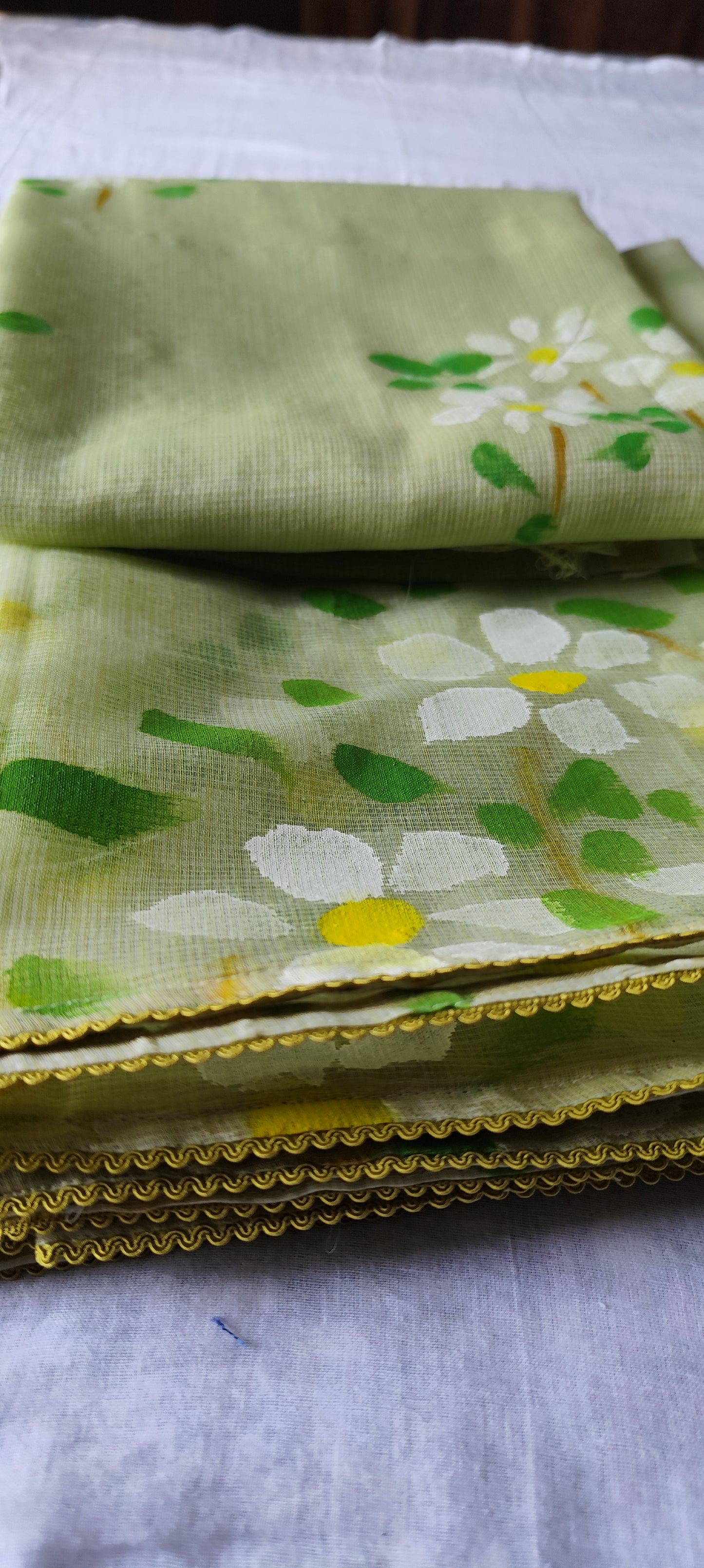Pista green handpainted kota doria suit with white motifs