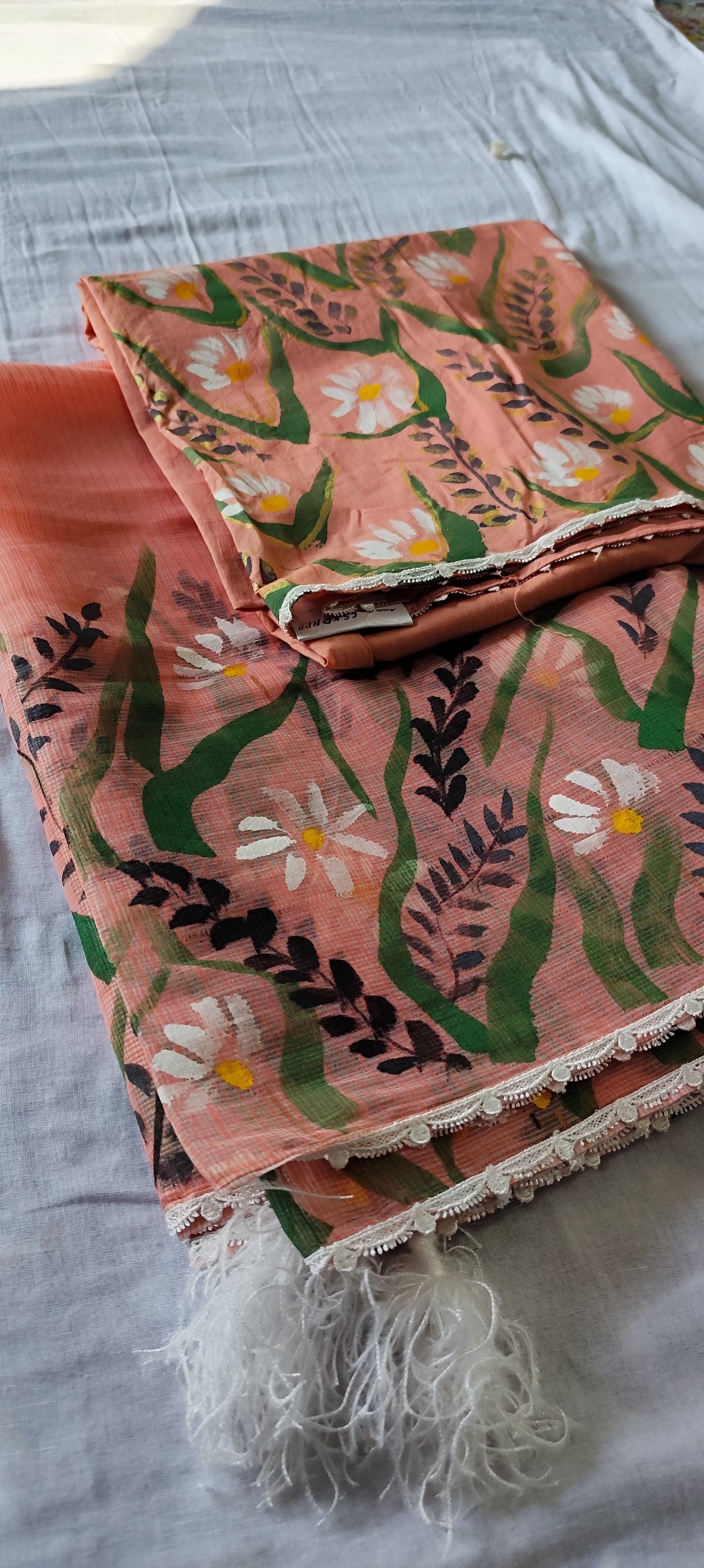 Hand-painted white flowers on peach cotton suit with kota doria dupatta