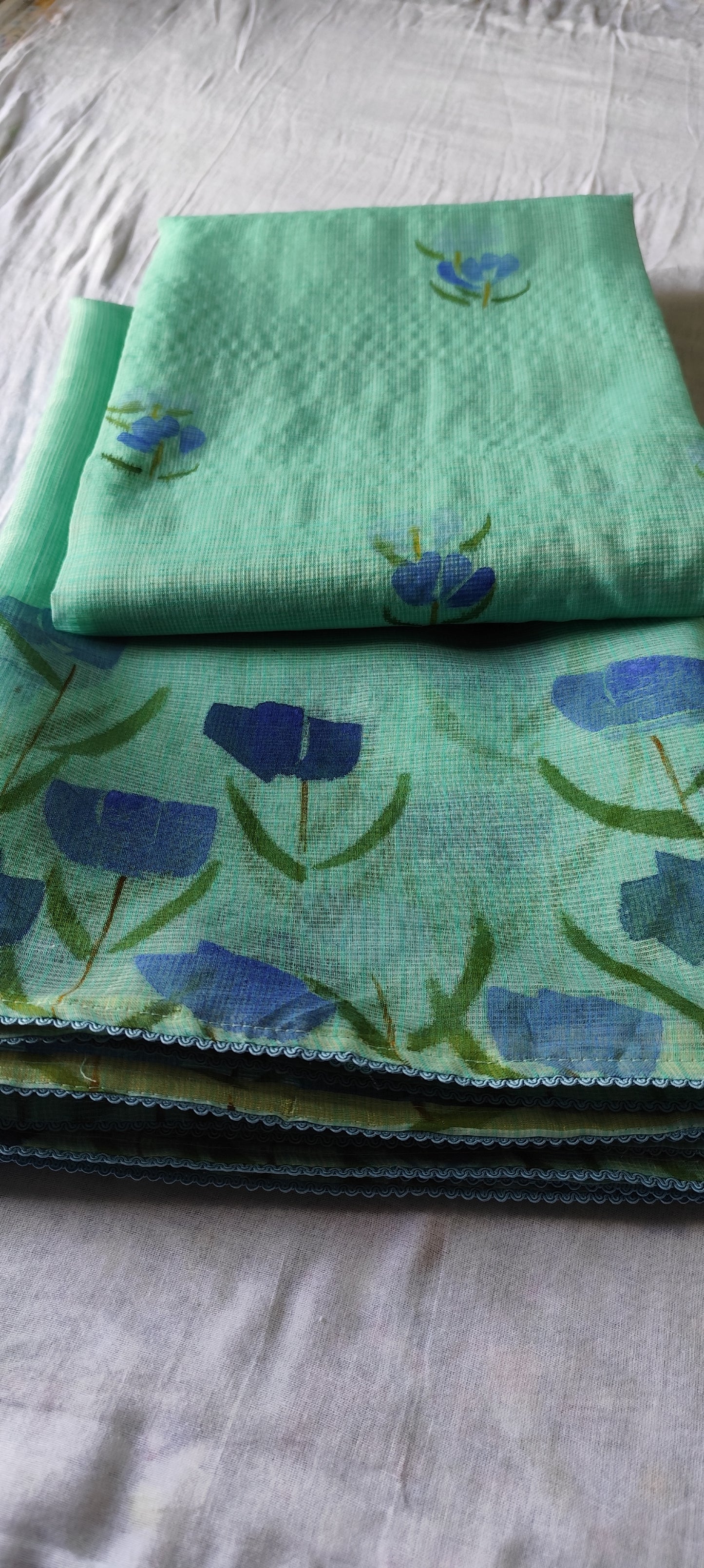Turquoise blue hand painted blossoms on kota doria