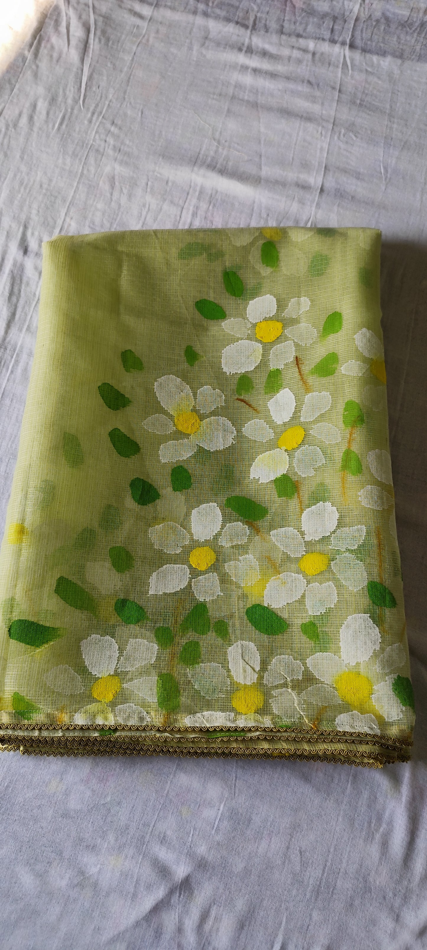 Pista green handpainted kota doria suit with white motifs
