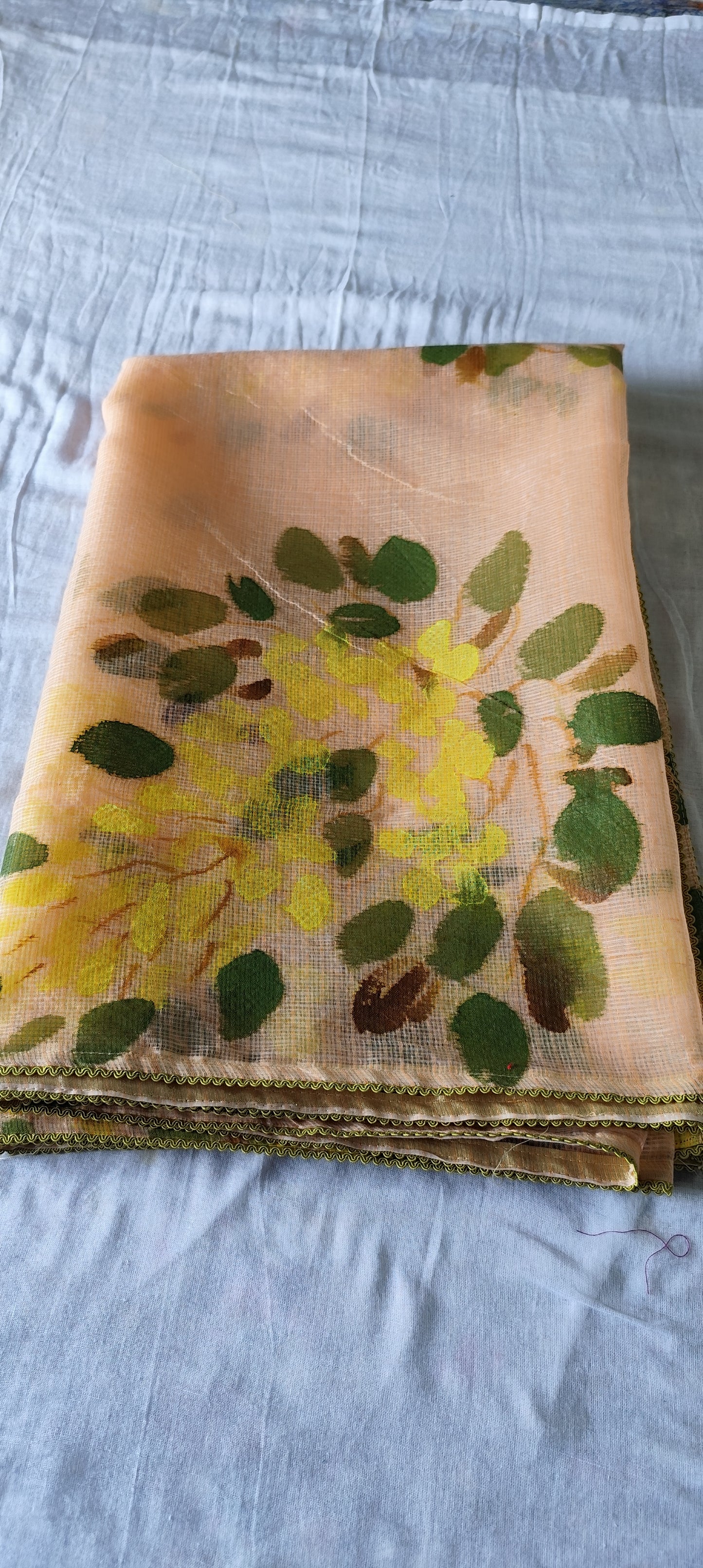 Handpainted amaltas on peach kota doria suit