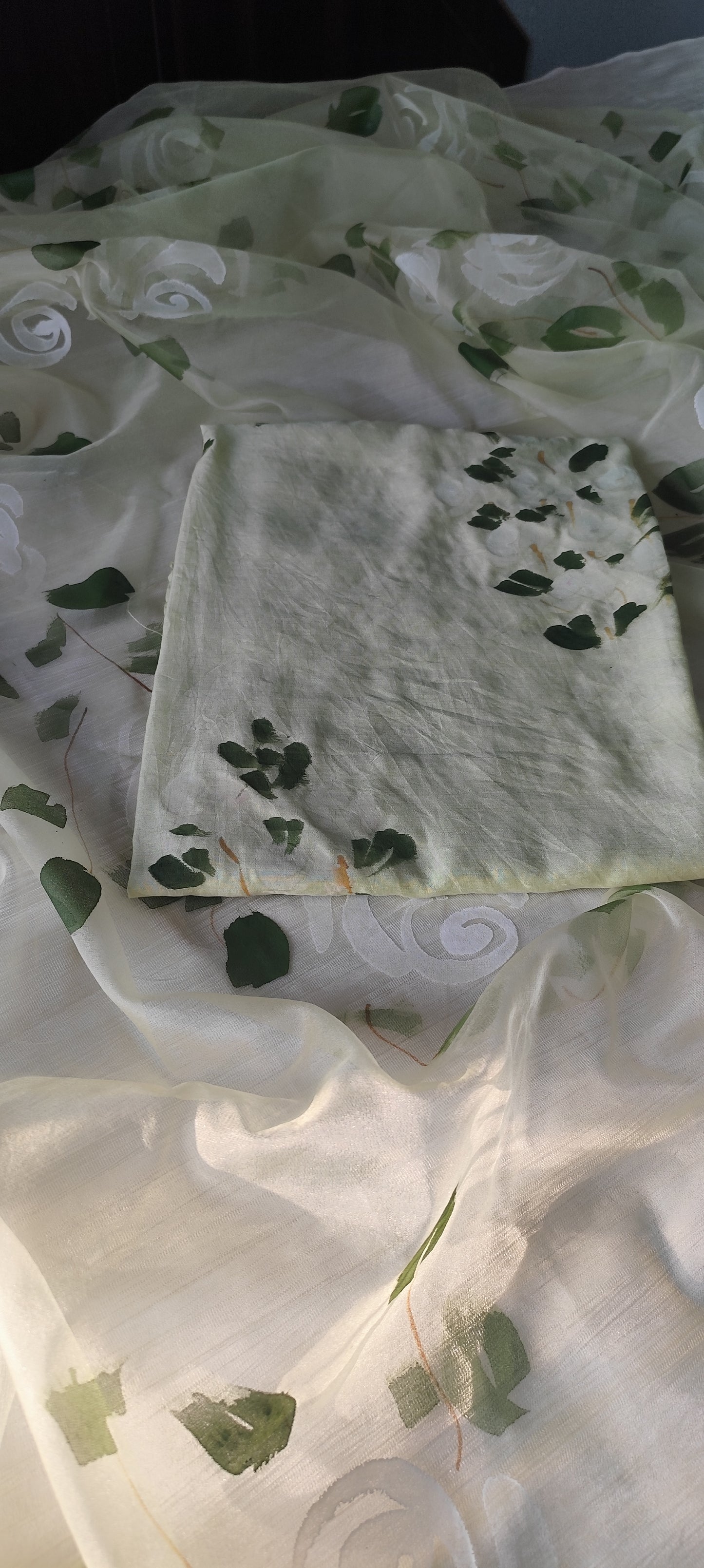 Hand painted roses on Pista green chanderi suit with organza dupatta