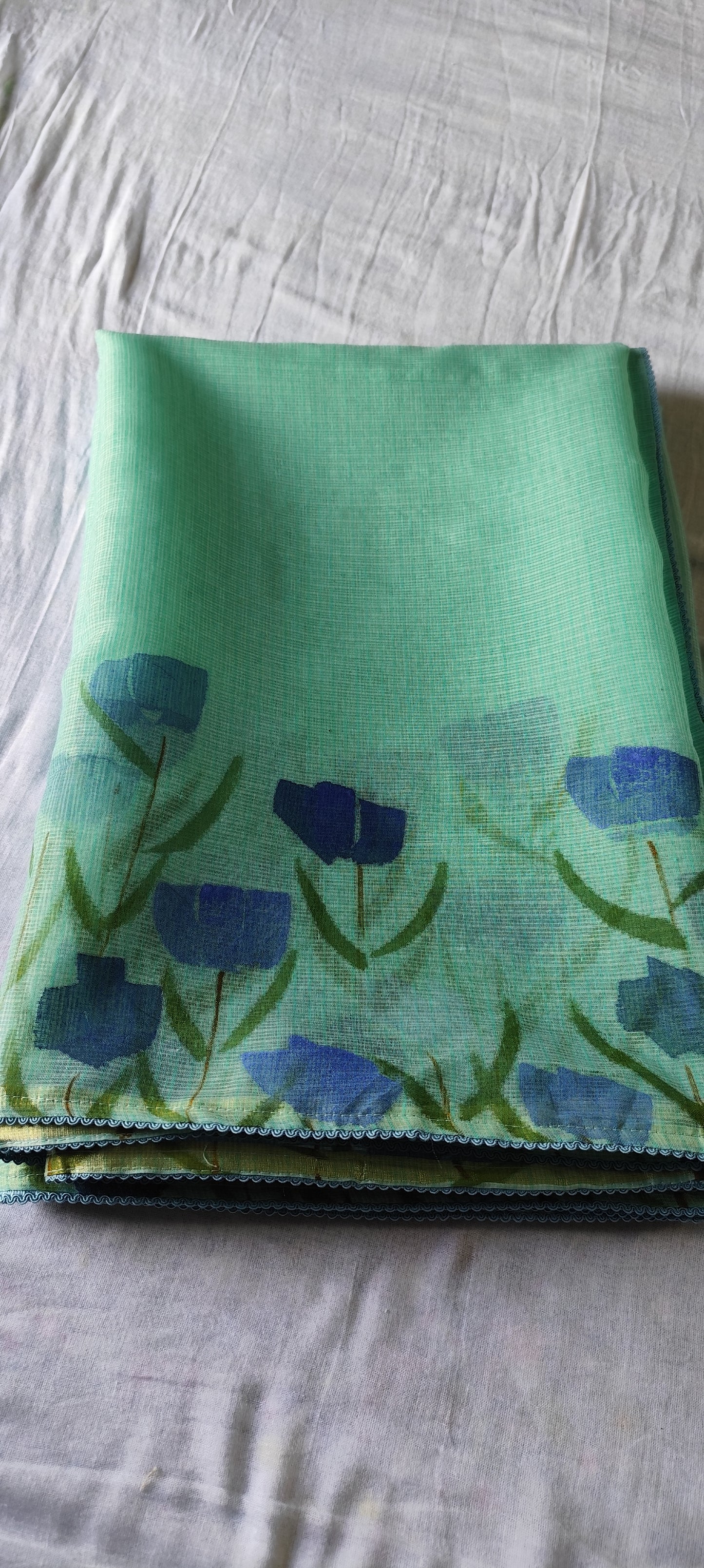 Turquoise blue hand painted blossoms on kota doria
