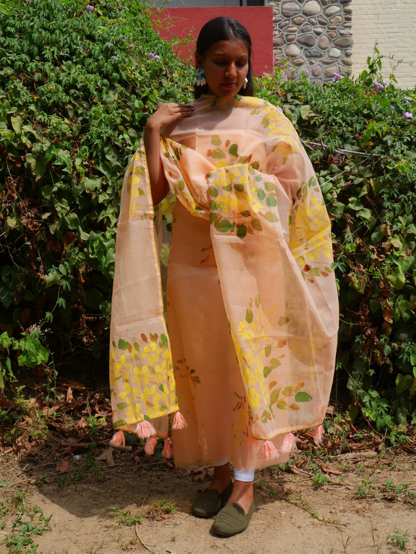 Handpainted amaltas on peach kota doria suit